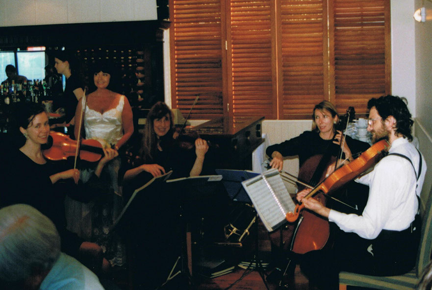 The Haydn String Quartet plays for a wedding at the Port Nicholson Yacht Club in Wellington.